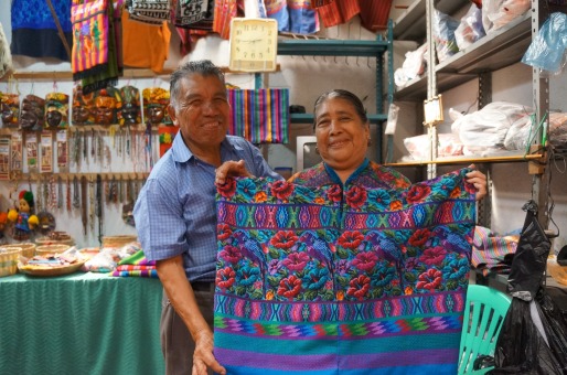 Herminia Santos and her husband Chavelo showing off my huipil woven by their daughter-in-law Marta Leticia.